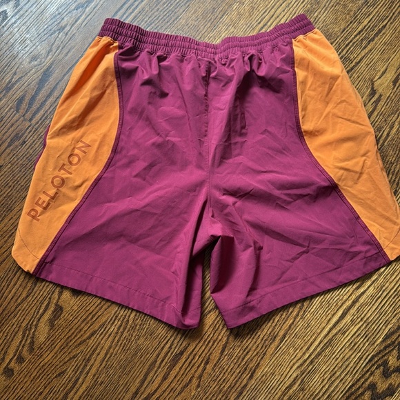E Peloton burgundy/orange elastic drawstring waist technical fabric shorts. Med - Picture 3 of 5